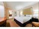 Cozy bedroom with a king bed, neutral tones, and connecting bathroom creating a relaxing retreat at 135 Harmon Ave # 3220, Las Vegas, NV 89109