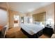 Bright bedroom with comfortable king bed, side tables, and connecting bathroom, creating a serene and inviting atmosphere at 135 Harmon Ave # 3220, Las Vegas, NV 89109