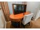 Bedroom desk with mounted TV and comfortable chair, perfect for a relaxing getaway at 135 Harmon Ave # 3220, Las Vegas, NV 89109