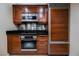 Detailed view of stainless steel oven, microwave, cooktop, and refrigerator at 135 Harmon Ave # 3220, Las Vegas, NV 89109