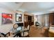 Inviting living room with television, dining table, sofa, and ample space for relaxation at 135 Harmon Ave # 3220, Las Vegas, NV 89109