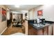 Cozy living area features a dining table with sink and comfortable seating at 135 Harmon Ave # 3220, Las Vegas, NV 89109