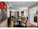 Comfortable living area with dining table, cozy seating, and well-placed lighting at 135 Harmon Ave # 3220, Las Vegas, NV 89109