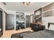 Bedroom with a workspace, stylish decor, and a comfortable bed at 1701 Linden Ave, Las Vegas, NV 89101