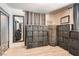 View of bedroom with cube storage units and a daybed, showcasing storage and functionality of the space at 1701 Linden Ave, Las Vegas, NV 89101