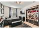 Cozy bedroom features dark decor, a bed with comfy bedding, and closet storage at 1701 Linden Ave, Las Vegas, NV 89101