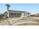A charming single-story home with a horizontally slatted privacy enclosure on a sunny day at 1701 Linden Ave, Las Vegas, NV 89101