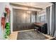 Cozy living space features custom built-ins, natural light, and a stylish piano at 1701 Linden Ave, Las Vegas, NV 89101