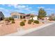 Inviting home exterior with well-maintained landscaping and a desert-friendly yard at 2115 Colvin Run Dr, Henderson, NV 89052