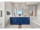 Stylish bathroom featuring double sinks, modern fixtures, and a luxurious bathtub at 23 Cerchio Basso, Henderson, NV 89011