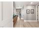 Inviting entryway boasting light hardwood floors, neutral paint, and attractive decor at 23 Cerchio Basso, Henderson, NV 89011