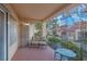 Relaxing covered patio with comfortable seating and decorative ironwork at 2508 Palmridge Dr, Las Vegas, NV 89134
