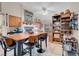 Open floor plan dining room with tile flooring and decorative shelving at 2508 Palmridge Dr, Las Vegas, NV 89134