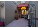 Inviting entrance with a decorative iron gate and covered patio area at 2508 Palmridge Dr, Las Vegas, NV 89134