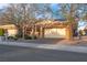 Charming single-story home with a two-car garage and well-maintained landscaping at 2508 Palmridge Dr, Las Vegas, NV 89134