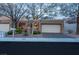 Charming single-story home featuring a two-car garage and mature landscaping at 2508 Palmridge Dr, Las Vegas, NV 89134