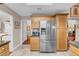 Bright kitchen featuring stainless steel refrigerator and pantry at 2508 Palmridge Dr, Las Vegas, NV 89134
