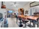 Open floor plan living room featuring tile flooring, fireplace and dining area at 2508 Palmridge Dr, Las Vegas, NV 89134