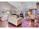 Comfortable living room with a sliding glass door to the patio and fireplace at 2508 Palmridge Dr, Las Vegas, NV 89134