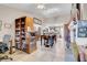 Open floor plan with tile flooring that connects the living room, dining room and kitchen at 2508 Palmridge Dr, Las Vegas, NV 89134