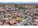 An aerial shot of homes in a neighborhood showcasing the street layout, and overall community ambiance at 2608 Saltbush Dr, Las Vegas, NV 89134