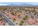 Captivating aerial view of homes in a community, showing the layout, greenery, and neighborhood's charming appeal at 2608 Saltbush Dr, Las Vegas, NV 89134