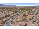 Picturesque aerial view of a residential area with lush greenery and well-kept homes, creating a serene atmosphere at 2608 Saltbush Dr, Las Vegas, NV 89134