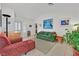 Bright living room with vaulted ceilings, showcasing comfortable seating and stylish decor at 2608 Saltbush Dr, Las Vegas, NV 89134