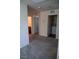 Bedroom view includes doorways, grey carpeting and a laundry closet with a washer and dryer visible at 2765 Frosted Teal Ave, North Las Vegas, NV 89086