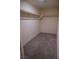 Walk in closet with carpeted floors and rod and shelf storage at 2765 Frosted Teal Ave, North Las Vegas, NV 89086