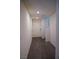 Bright hallway featuring hard surface flooring and neutral paint at 2765 Frosted Teal Ave, North Las Vegas, NV 89086