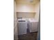 Laundry room featuring a washer and dryer hookup and overhead shelf at 2765 Frosted Teal Ave, North Las Vegas, NV 89086