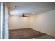 Spacious living area with a ceiling fan and lots of natural light at 2765 Frosted Teal Ave, North Las Vegas, NV 89086