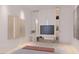 Bright bedroom with a TV, statement art, and a vanity with a stool at 3 Climbing Canyon Dr, Henderson, NV 89052