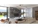 Modern living room with a designer media wall and a view of the outdoor pool at 3 Climbing Canyon Dr, Henderson, NV 89052