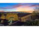 Panoramic view of the mountains and city lights from the fenced backyard and patio at 3042 Lake Barkley Rd, Henderson, NV 89052