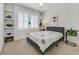 Comfortable bedroom with neutral decor, natural light, and a calming, minimalist aesthetic at 3042 Lake Barkley Rd, Henderson, NV 89052