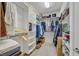 Walk-in closet with custom shelving and ample storage space for clothes and personal items at 3042 Lake Barkley Rd, Henderson, NV 89052