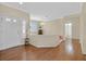 Elegant entry hall with gleaming wood floors and a decorative chandelier at 3042 Lake Barkley Rd, Henderson, NV 89052