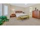 Cozy main bedroom featuring neutral colors and shuttered windows at 3042 Lake Barkley Rd, Henderson, NV 89052