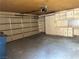 Spacious two car garage featuring built-in shelving and workshop area at 3422 Pino Cir, Las Vegas, NV 89121