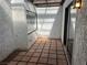 Private patio area with block pavers, neutral walls, and access to the home at 3422 Pino Cir, Las Vegas, NV 89121