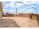 Fenced backyard with dirt landscaping at 3704 Haddock Ave, North Las Vegas, NV 89030
