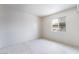 Cozy bedroom with fresh carpet and a bright window at 3704 Haddock Ave, North Las Vegas, NV 89030