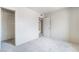 Clean bedroom with plush carpet and neutral tones at 3704 Haddock Ave, North Las Vegas, NV 89030