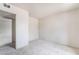 Neutral bedroom with carpet, bright light and adjacent closet at 3704 Haddock Ave, North Las Vegas, NV 89030