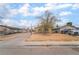 Modest single story home with front yard and car parking spaces at 3704 Haddock Ave, North Las Vegas, NV 89030