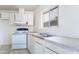 Functional kitchen with white appliances and a window view at 3704 Haddock Ave, North Las Vegas, NV 89030