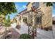 Beautiful backyard featuring a covered pergola, concrete patio and desert landscaping at 3728 White Lion Ln, North Las Vegas, NV 89084