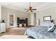 The main bedroom includes wood floors, recessed lights, and coffered ceilings at 4624 Leon De Oro Dr, Las Vegas, NV 89129